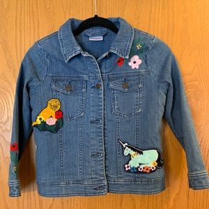 Adorable sherpa lined jean jacket. Cute embroidered patches on front and back.